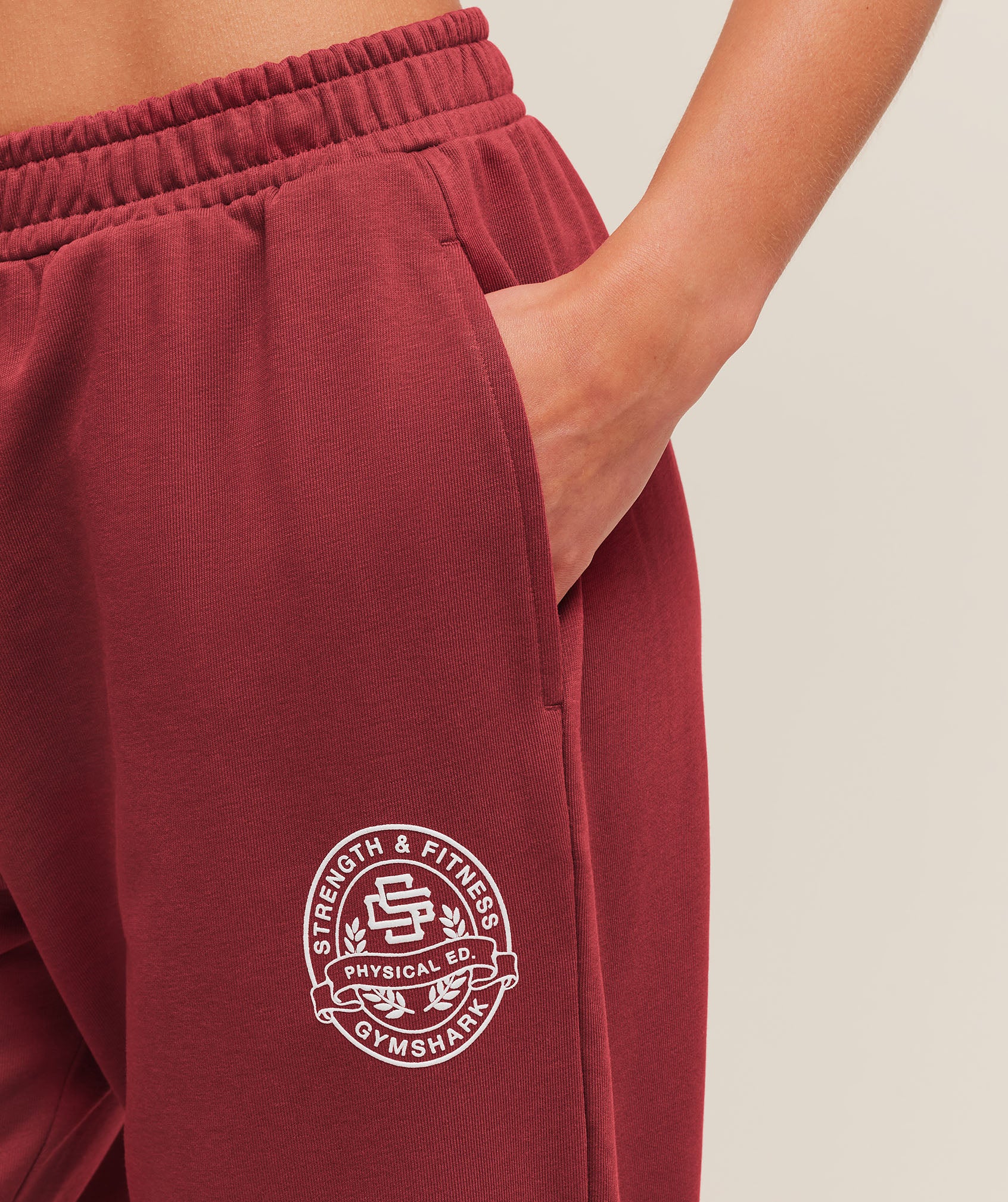 Gymshark Strength and Fitness Crest Graphic Joggers - Athletic Burgundy - Image 5
